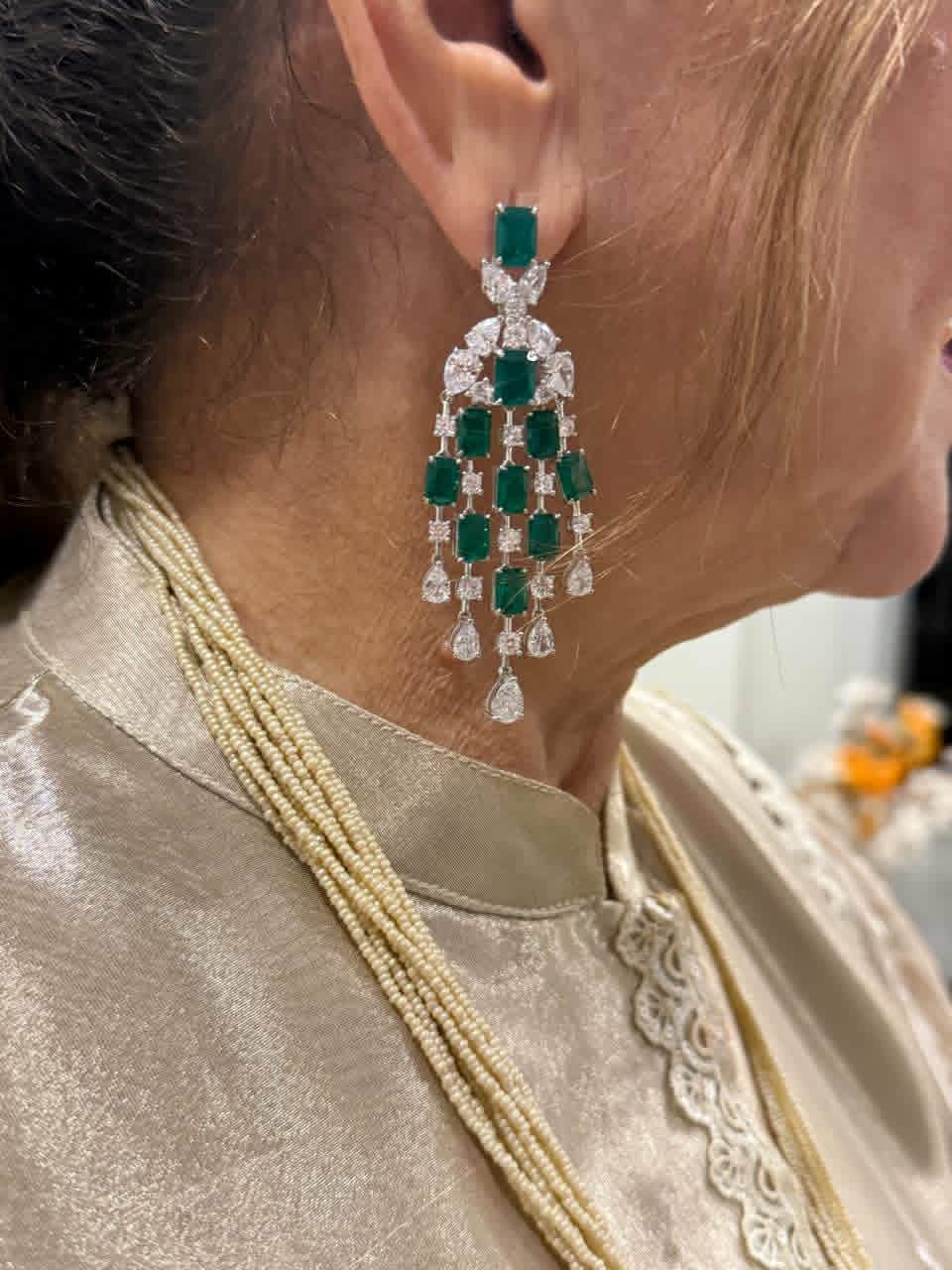 The Queen’ long stringy Victorian earrings