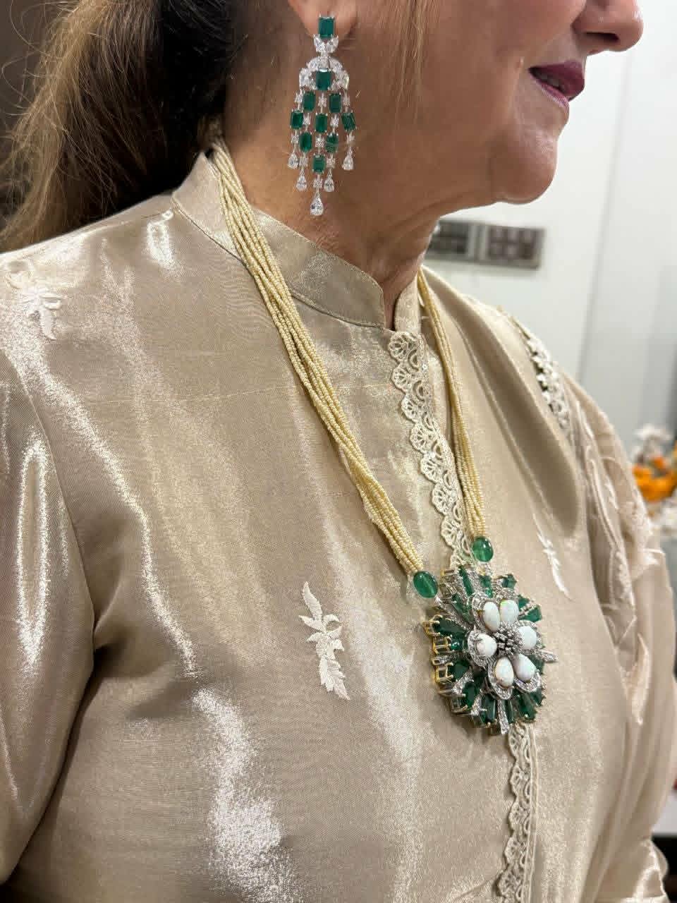 The Queen’ long stringy Victorian earrings