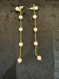 Gold string studded pearl