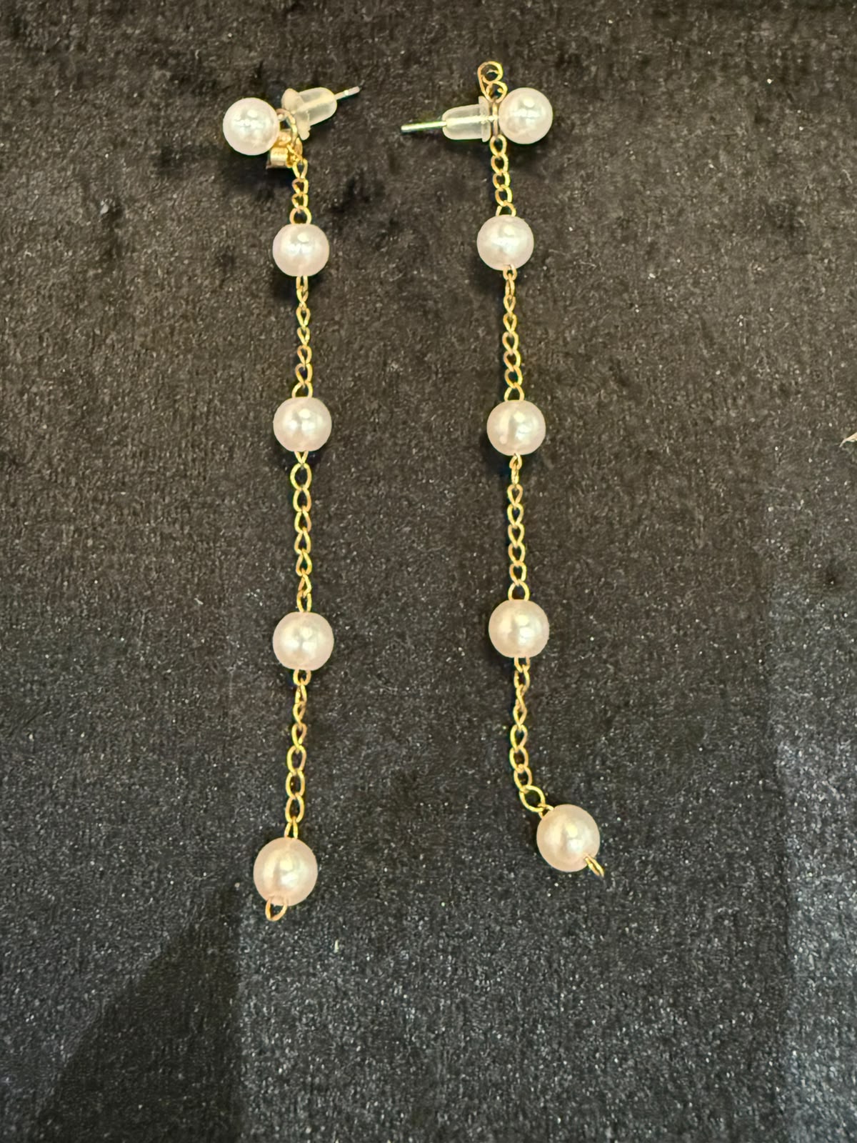 Gold string studded pearl