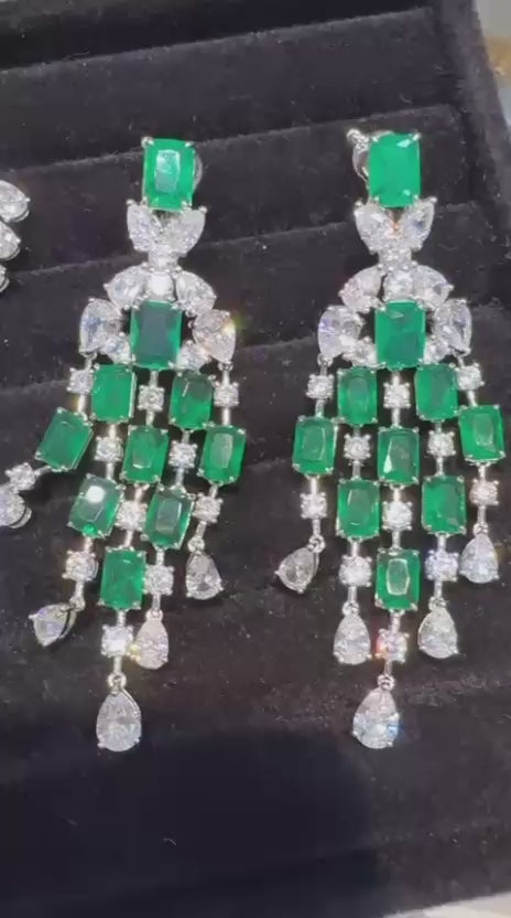 The Queen’ long stringy Victorian earrings